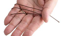 Cord wrapped around a hand